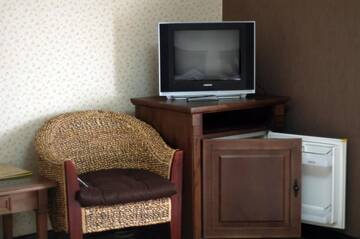 Фото номера Двухместный номер с 2 отдельными кроватями Отель Gogol Hotel г. Миргород 12