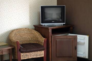 Фото номера Двухместный номер с 2 отдельными кроватями Отель Gogol Hotel г. Миргород 3